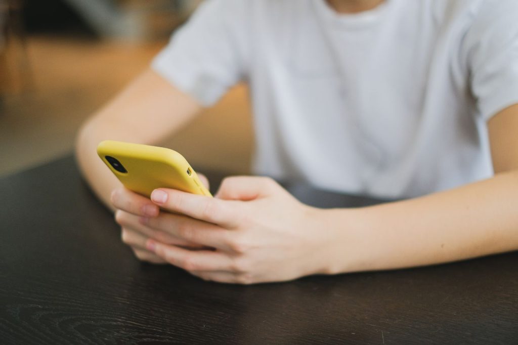 A person scrolling through their phone
