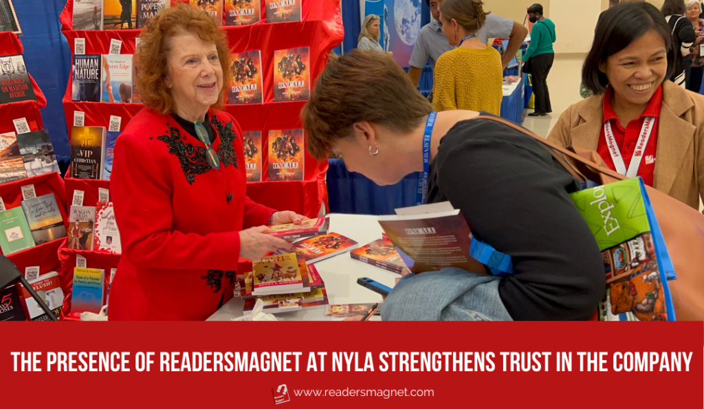 a fairgoer signing in ReadersMagnet's booth at NYLA