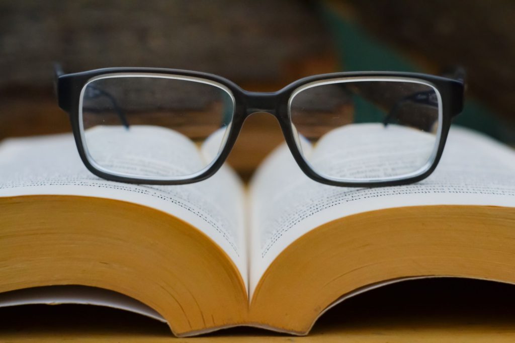 Glasses on top of a book
